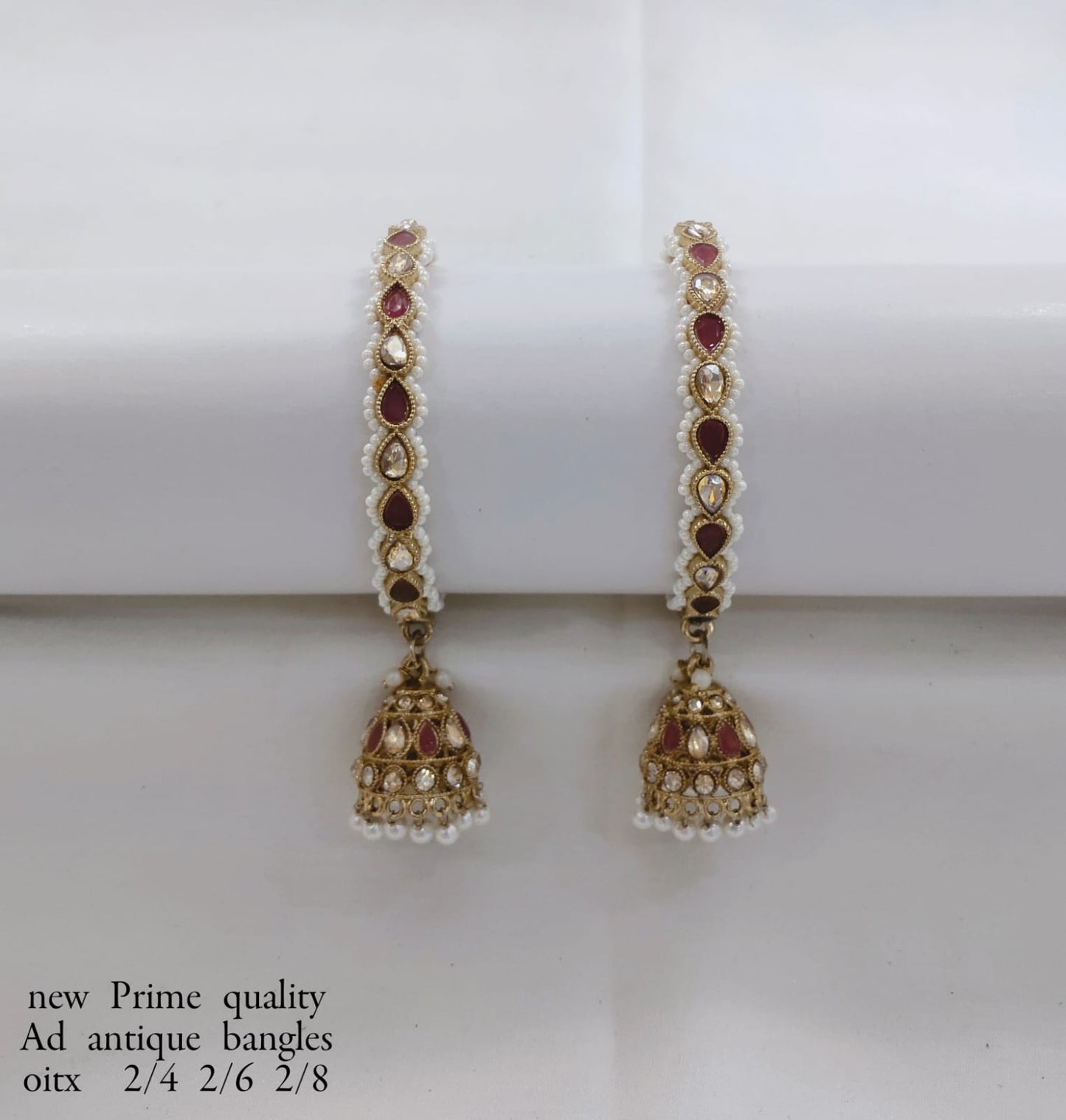 Antique Gold-Plated Bangle with Stones and Pearl Jhumka Drops – Prime Quality
