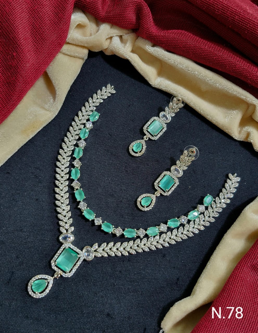 Elegant Leaf Motif Necklace and Earring Set with Gemstone Accents
