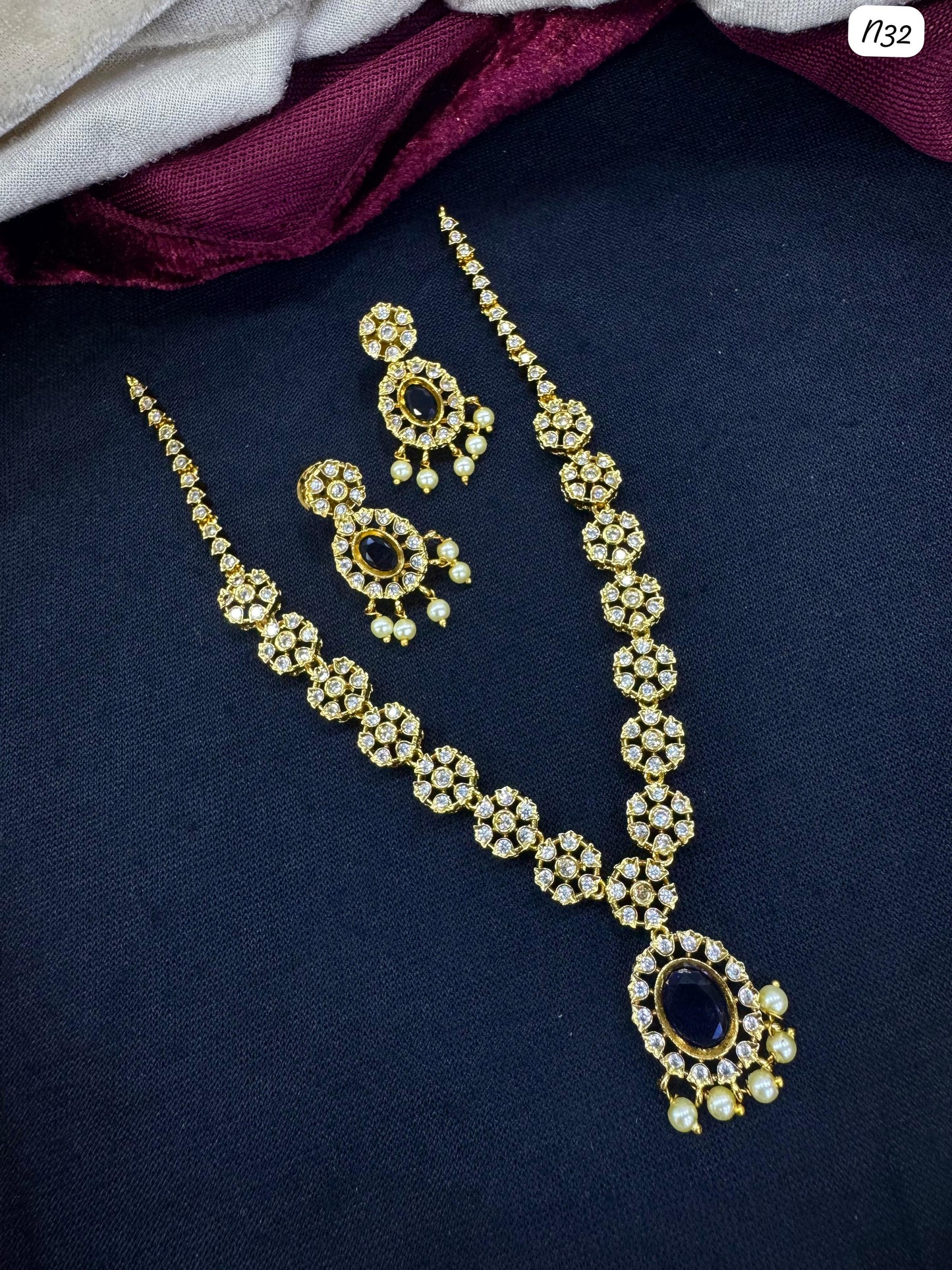 Kundan-Style AD Necklace and Earring Set with Stone and Pearl Detailing