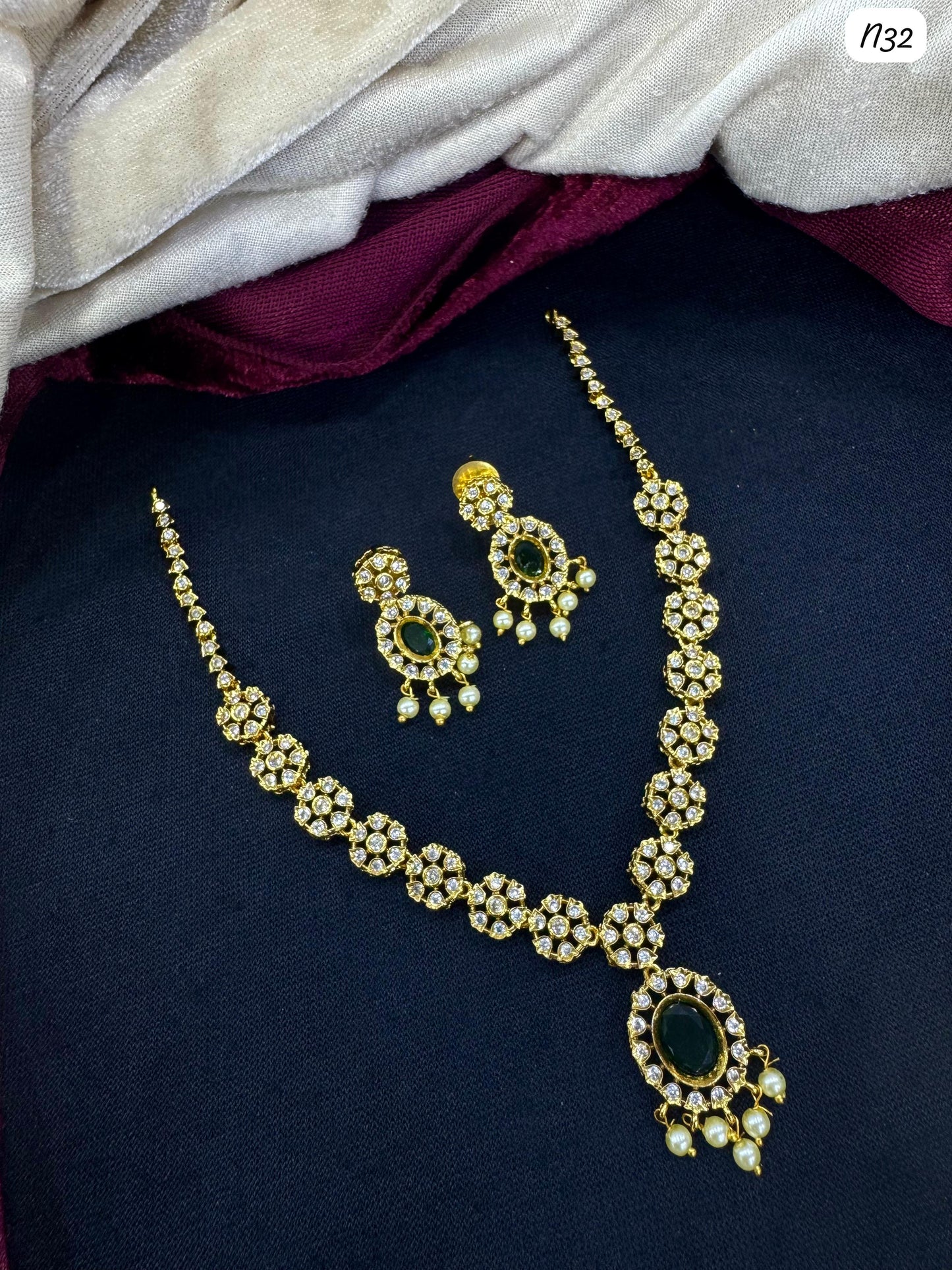 Kundan-Style AD Necklace and Earring Set with Stone and Pearl Detailing