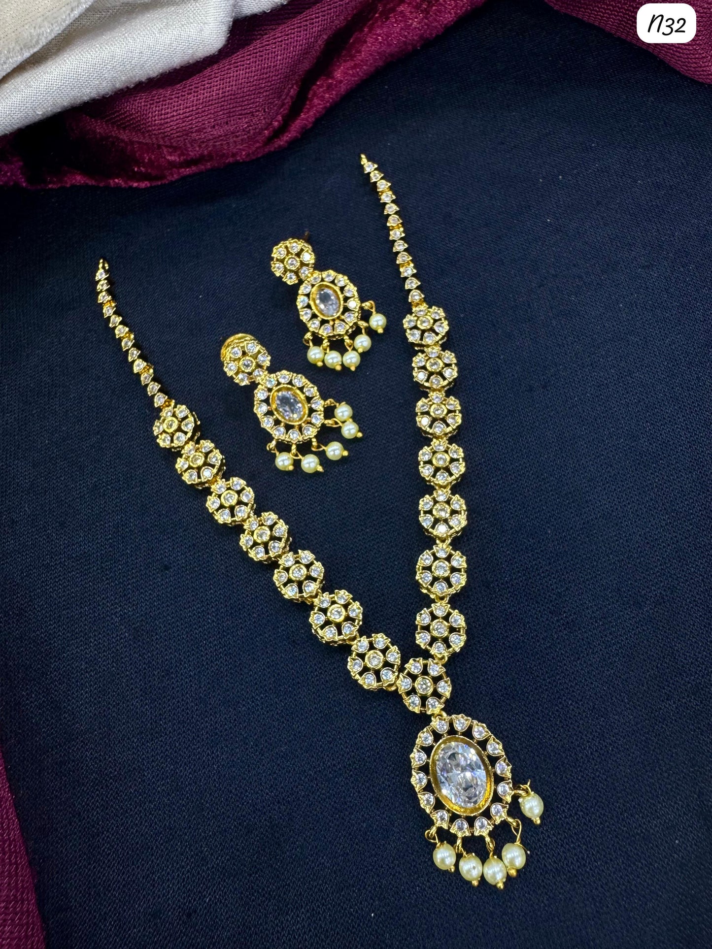 Kundan-Style AD Necklace and Earring Set with Stone and Pearl Detailing