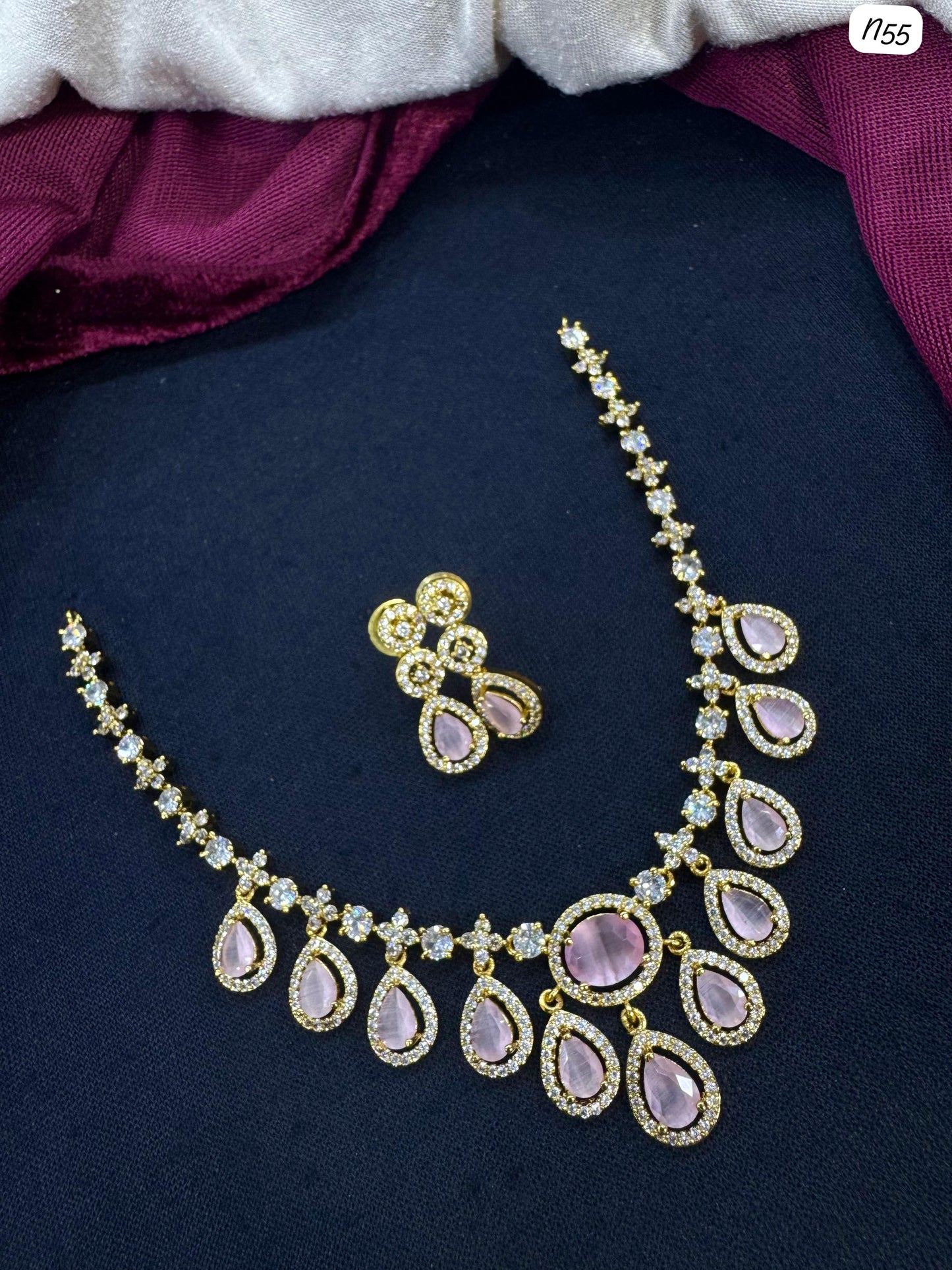 AD Necklace and Earring Set with Teardrop Stone Design