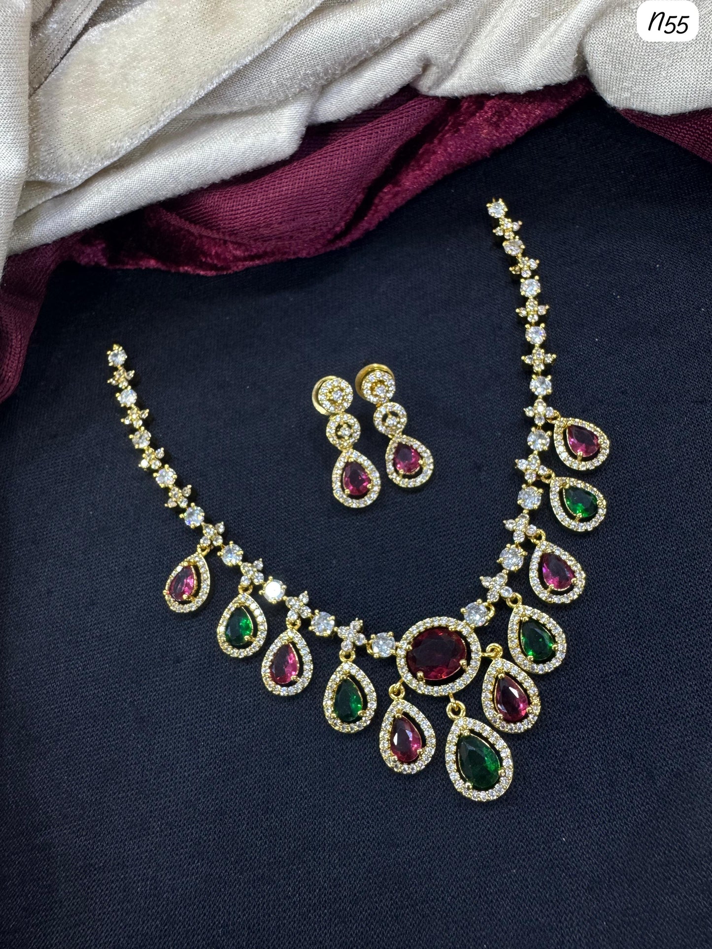AD Necklace and Earring Set with Teardrop Stone Design