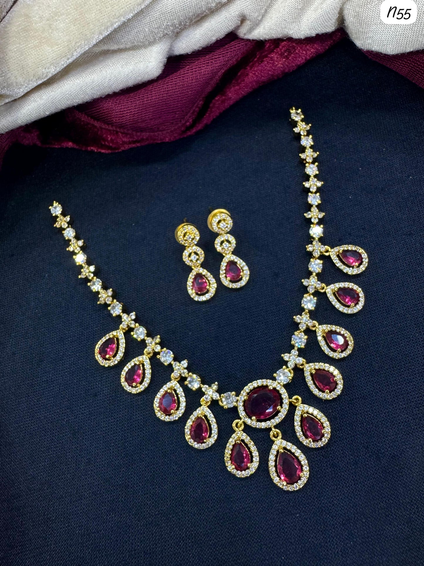 AD Necklace and Earring Set with Teardrop Stone Design