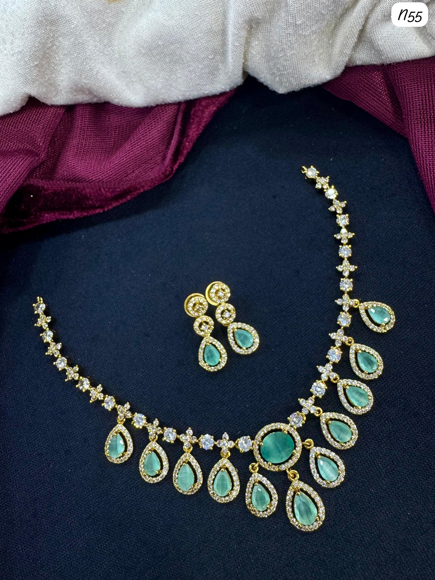 AD Necklace and Earring Set with Teardrop Stone Design