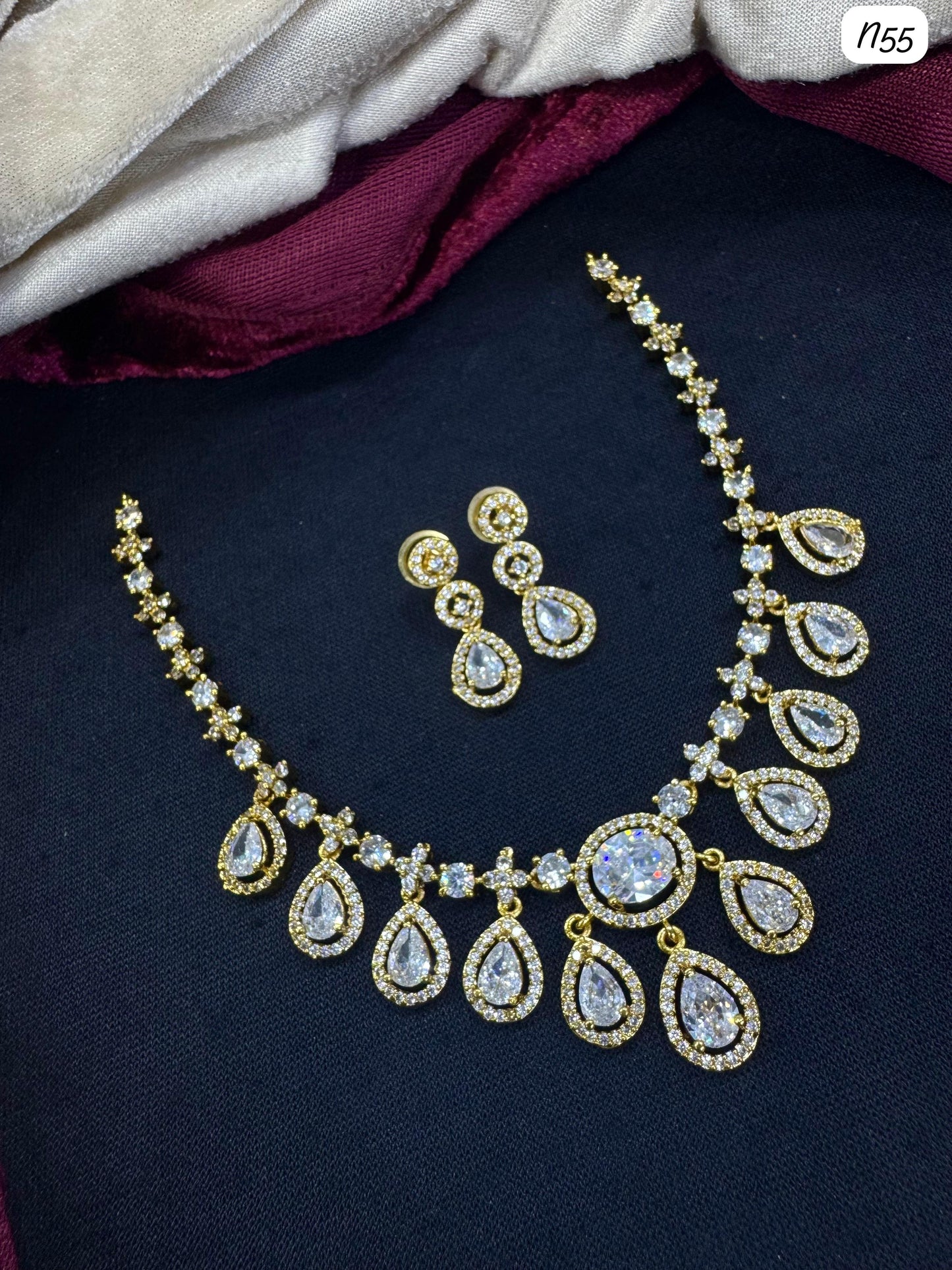 AD Necklace and Earring Set with Teardrop Stone Design