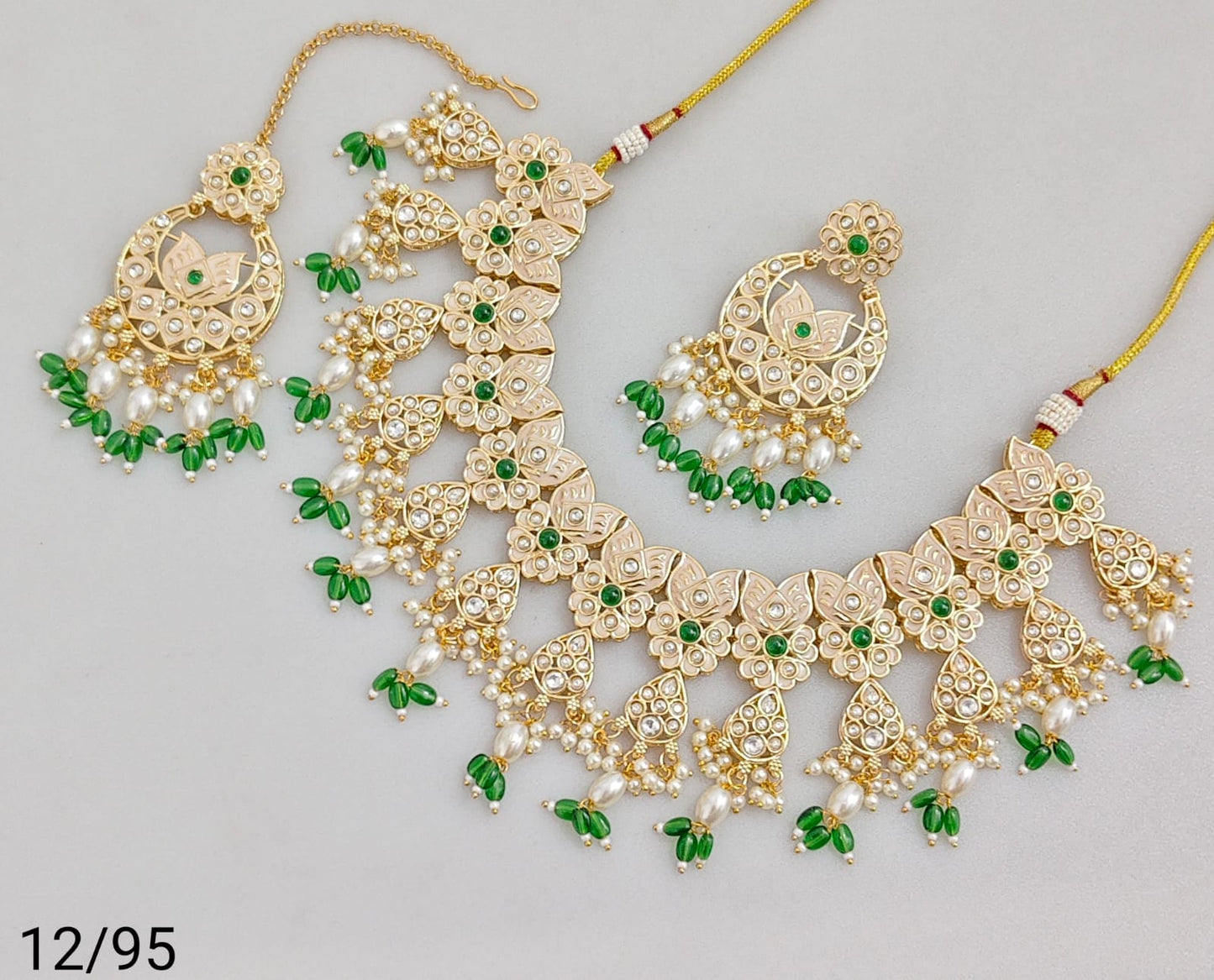 Elegant Traditional Jewelry Set with Intricate Detailing and Pearls