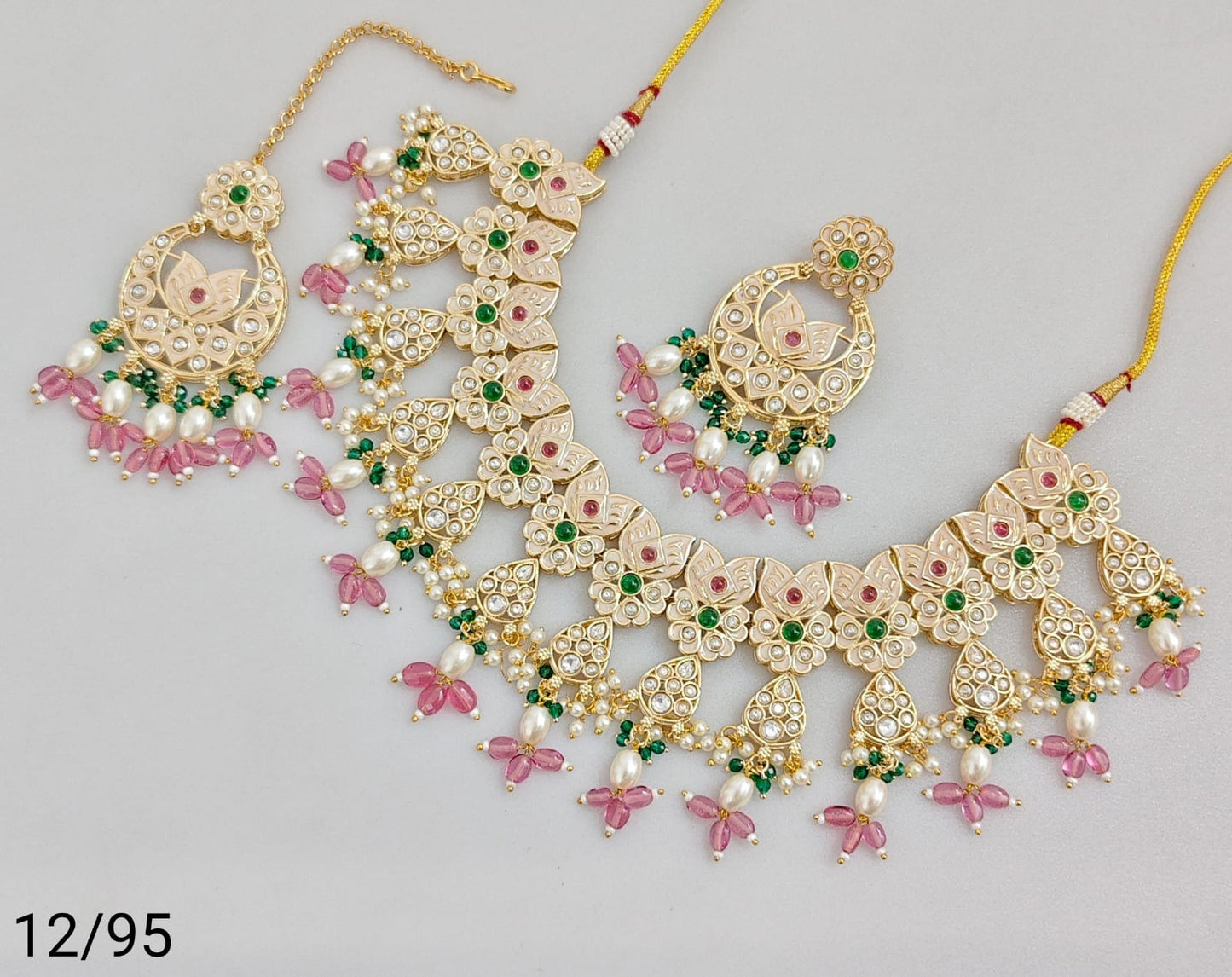 Elegant Traditional Jewelry Set with Intricate Detailing and Pearls
