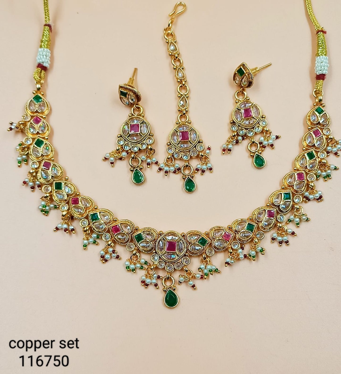 Elegant Traditional Jewelry Set with Intricate Detailing and Pearl Accents