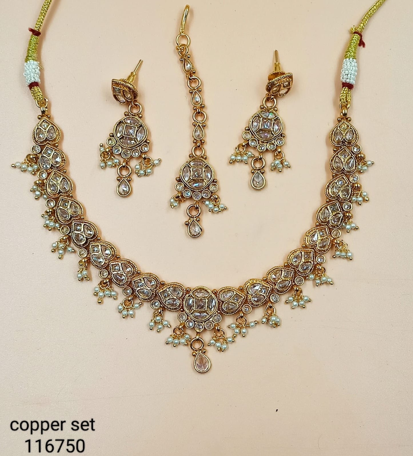 Elegant Traditional Jewelry Set with Intricate Detailing and Pearl Accents