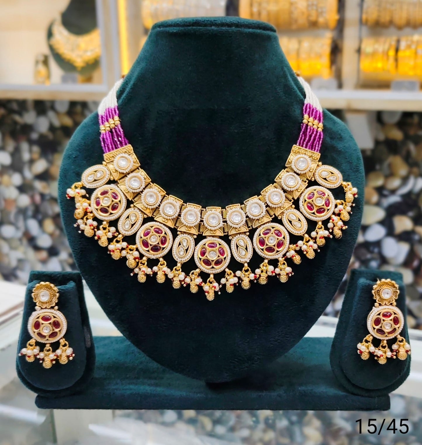 Gold Plated Copper Kundan Necklace Set with Round Motif and Matching Earrings