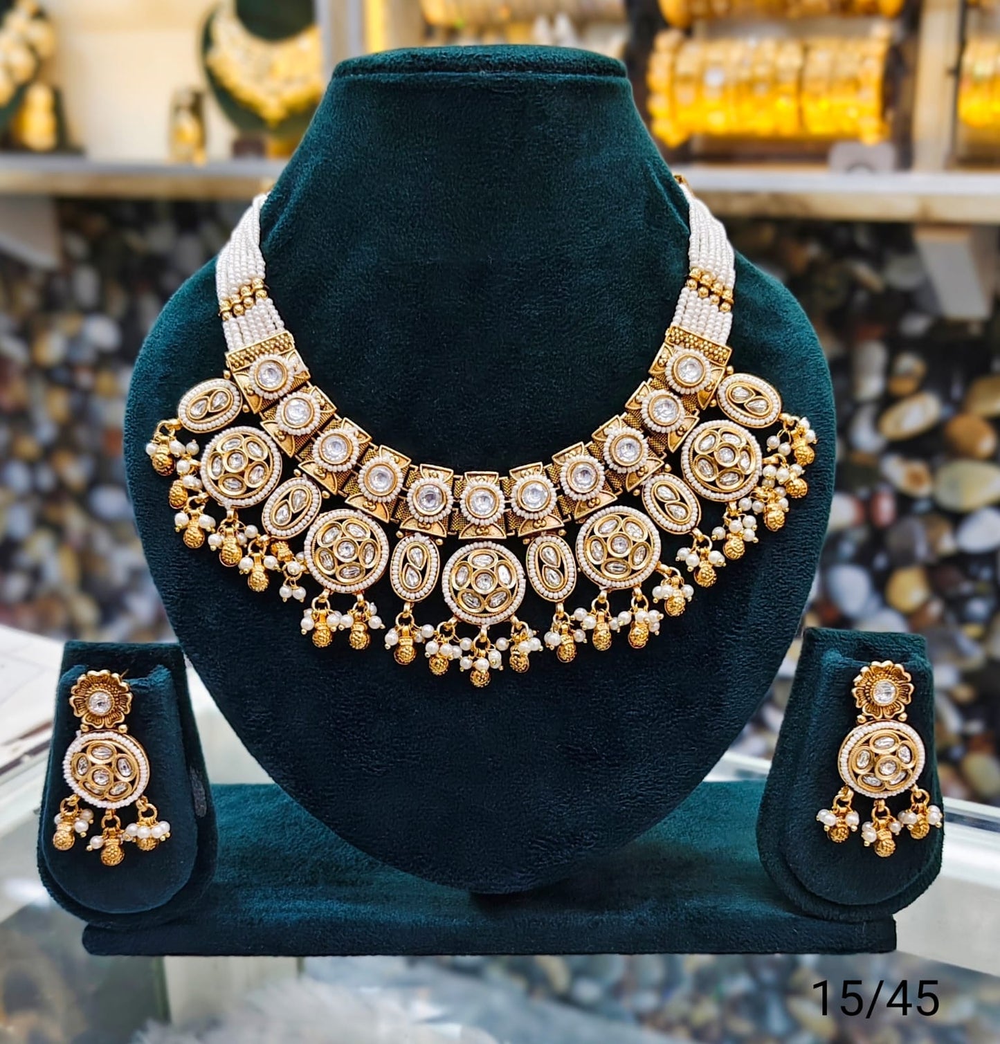 Gold Plated Copper Kundan Necklace Set with Round Motif and Matching Earrings