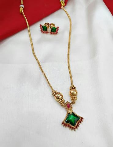 Geometric Ruby Kemp Pendant Necklace with Textured Gold Accents