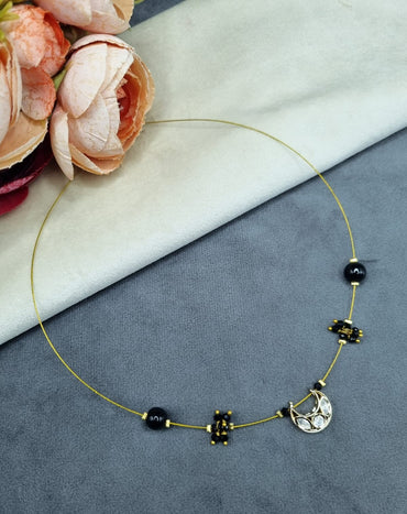 Invisible Wire Crescent Pendant Necklace with Black Bead Accents
