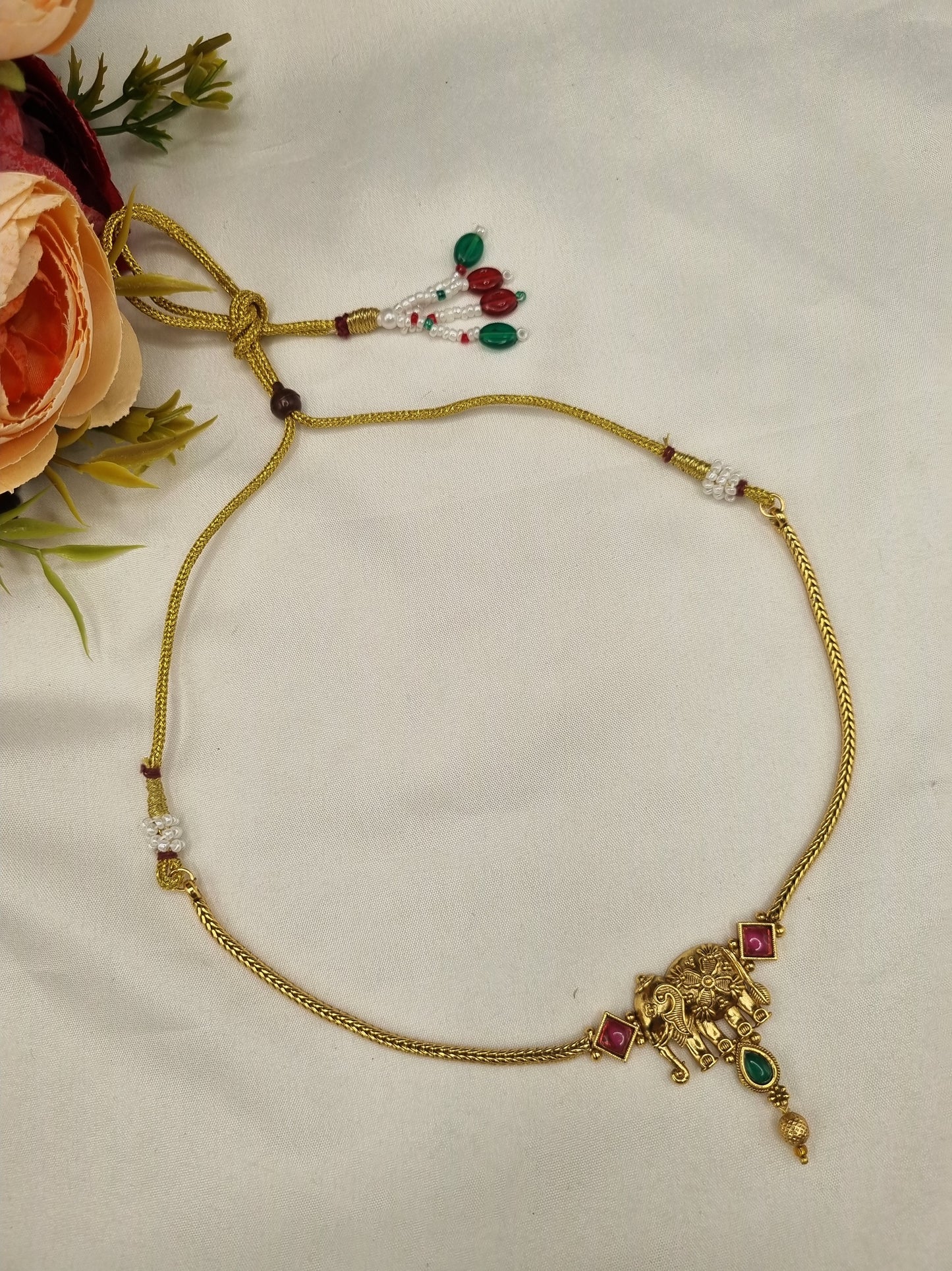 SUTHON GOLD FINISH ELEPHANT MOTIF NECKLACE SET WITH MATCHING STUDS