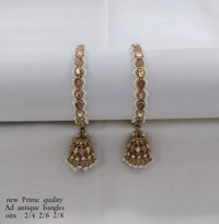 Antique Gold-Plated Bangle with Stones and Pearl Jhumka Drops – Prime Quality