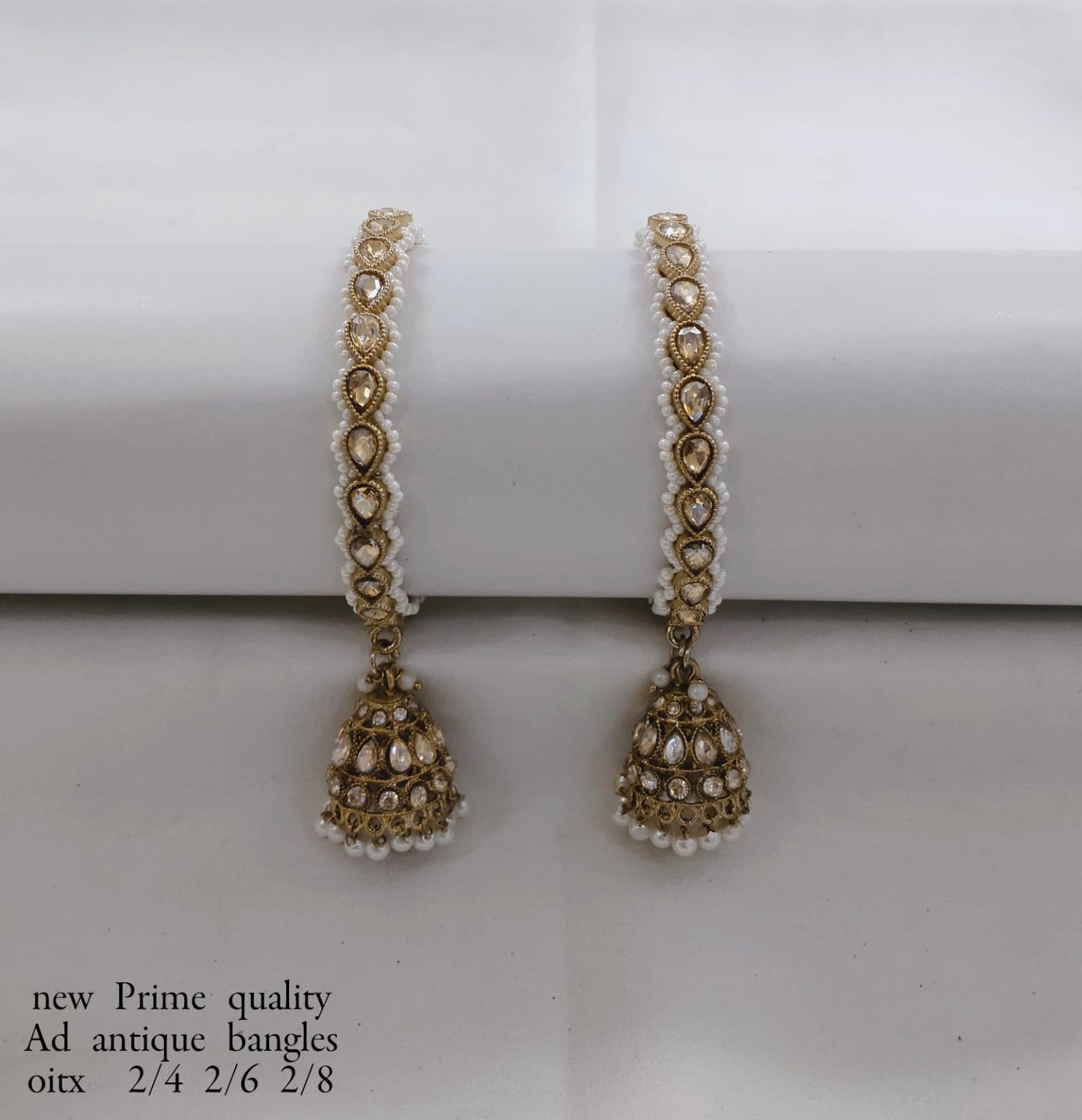 Antique Gold-Plated Bangle with Stones and Pearl Jhumka Drops – Prime Quality