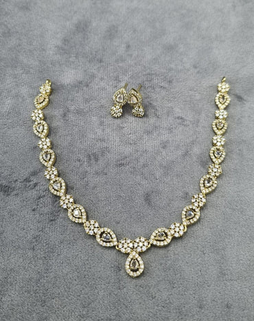 Rhodium-Plated Pear-Drop & Floral Necklace Set
