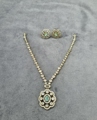 Vintage Floral Amethyst-Toned Pendant Set in Gold Finish with Studs