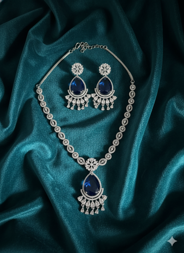 Designer Cluster AD Necklace with Blue Solitaire