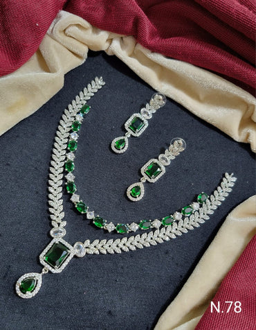 Elegant Leaf Motif Necklace and Earring Set with Gemstone Accents