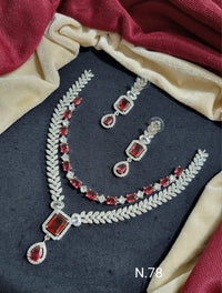 Elegant Leaf Motif Necklace and Earring Set with Gemstone Accents