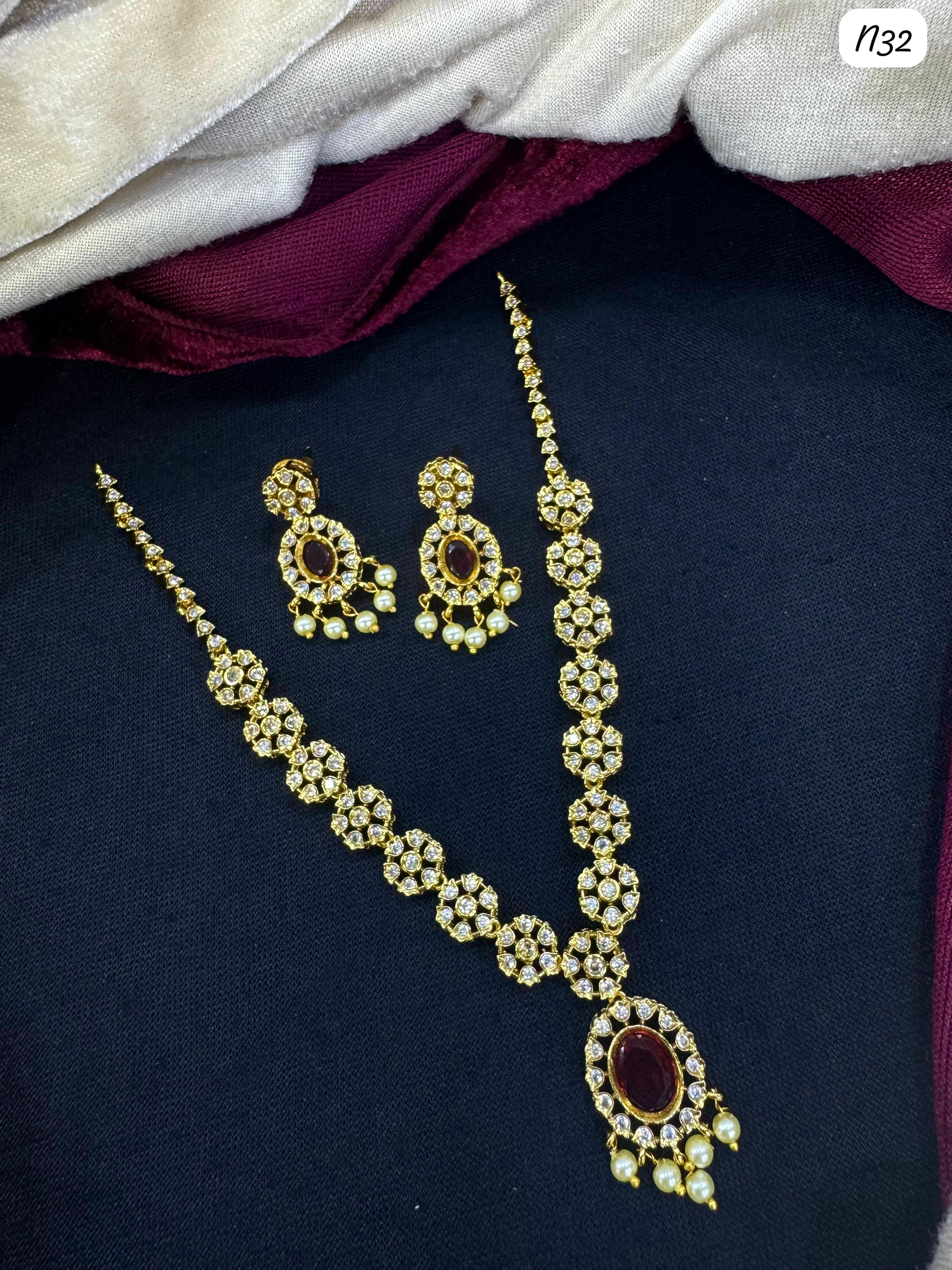 Kundan-Style AD Necklace and Earring Set with Stone and Pearl Detailing