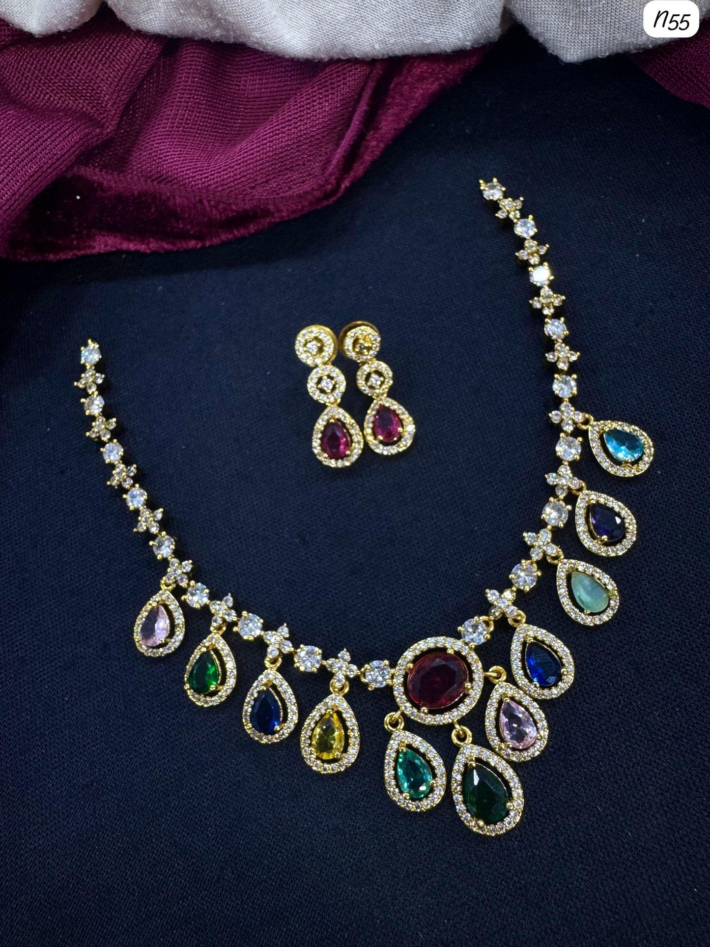 AD Necklace and Earring Set with Teardrop Stone Design