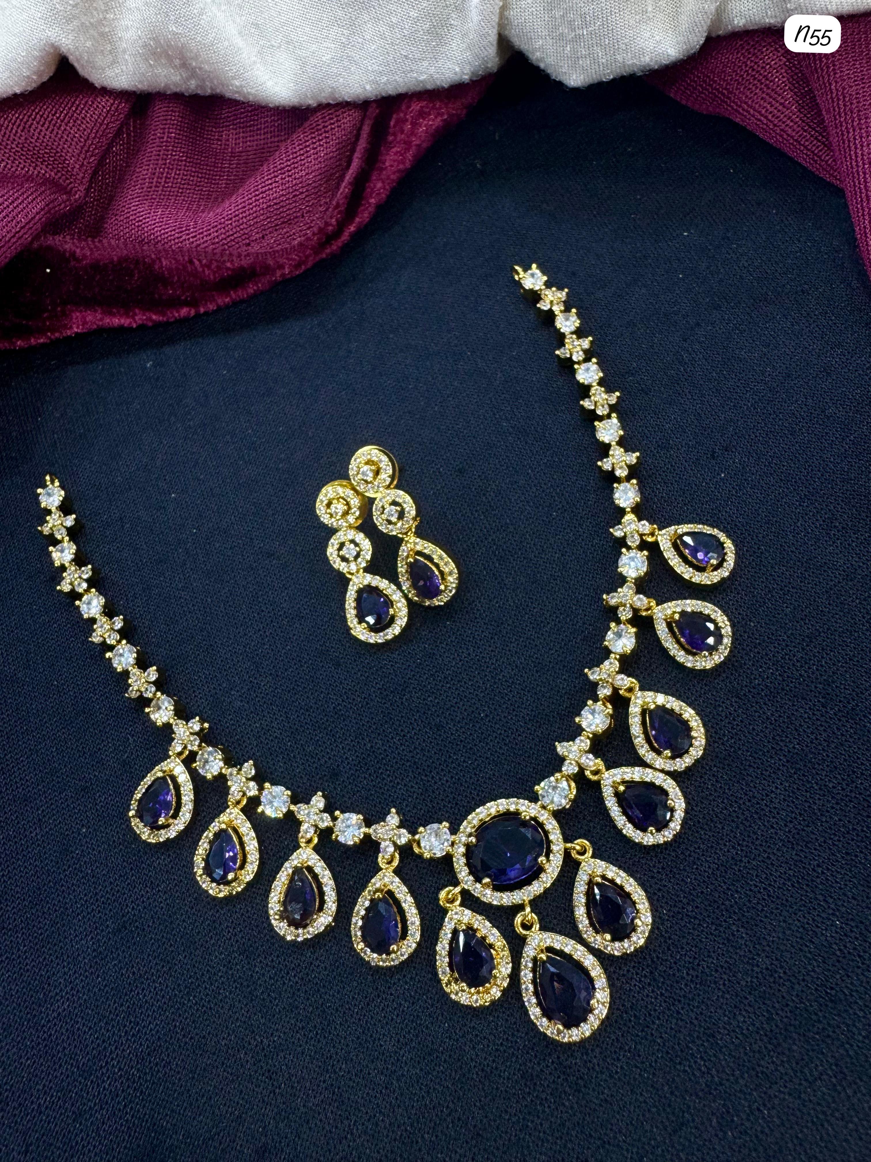 AD Necklace and Earring Set with Teardrop Stone Design