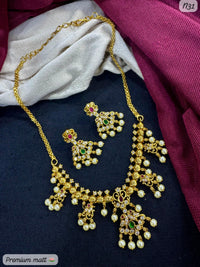 Premium Matte Gold-Plated Peacock Design AD Necklace Set with Pearl Drops & Matching Earrings