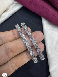 Elegant AD Stone Bangle with Baguette and Floral Detailing
