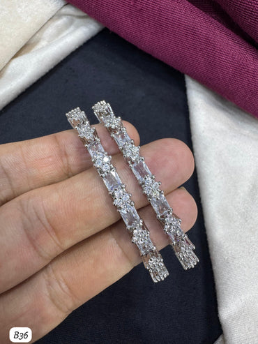 Elegant AD Stone Bangle with Baguette and Floral Detailing