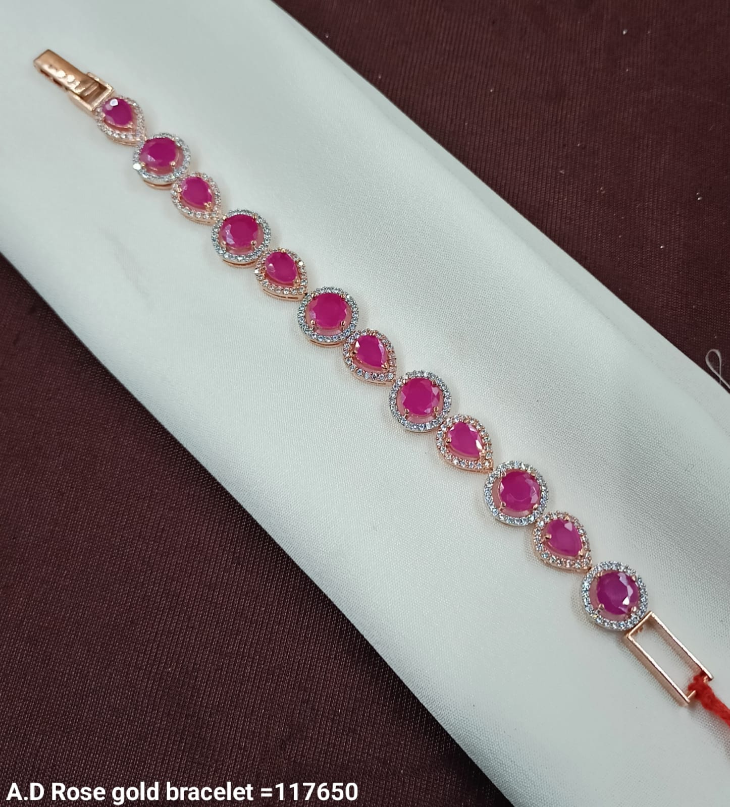 Rose Gold AD Bracelet with Ruby Pink Stones – Teardrop Design