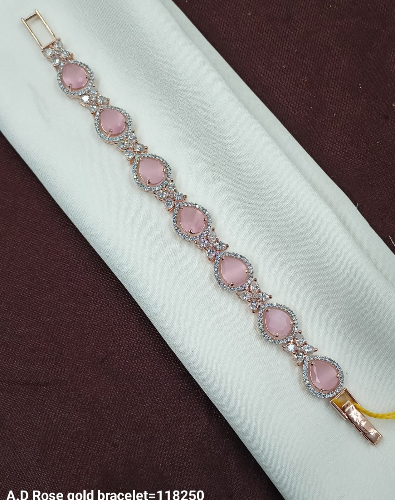 Rose Gold AD Bracelet with Teardrop Pink Stones – Graceful & Elegant