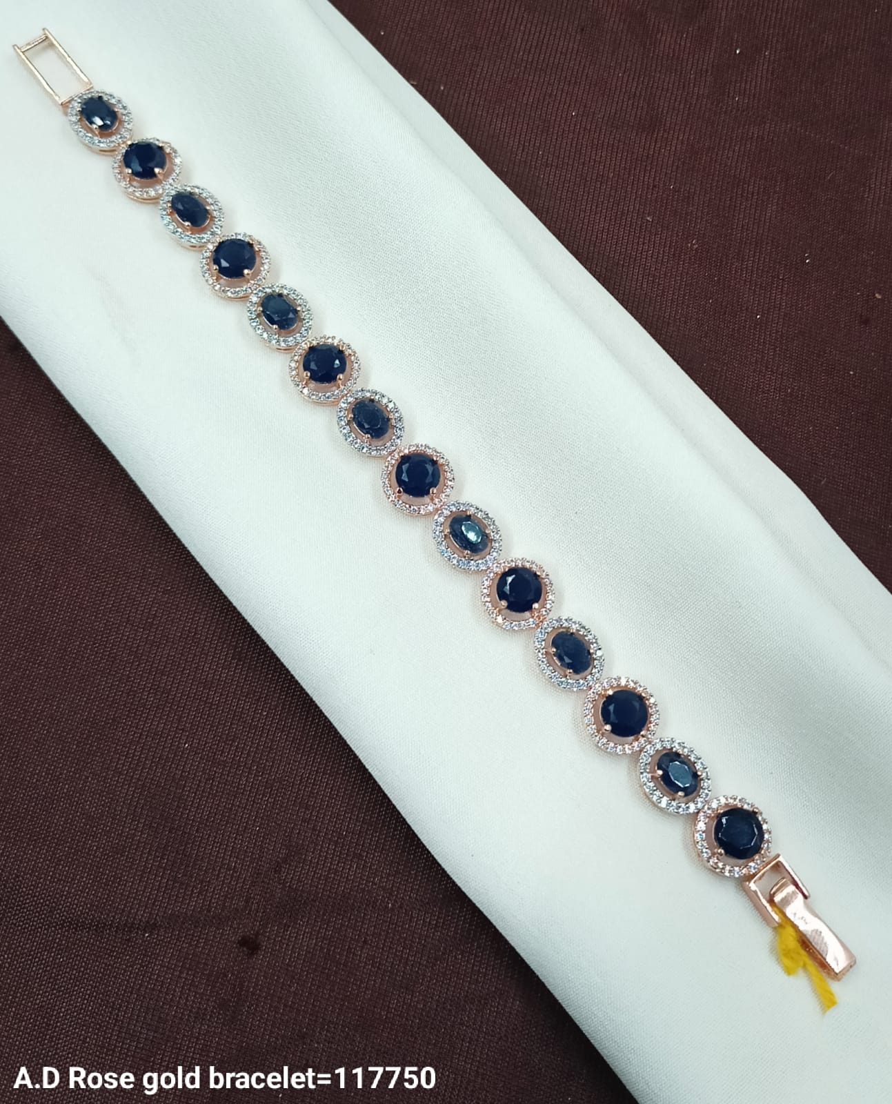 Rose Gold AD Bracelet with Deep Blue Oval Stones – Royal & Refined