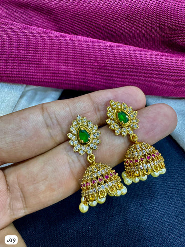 Floral Gold-Plated AD Jhumka Earrings with Green Centerpiece & Pearl Drops