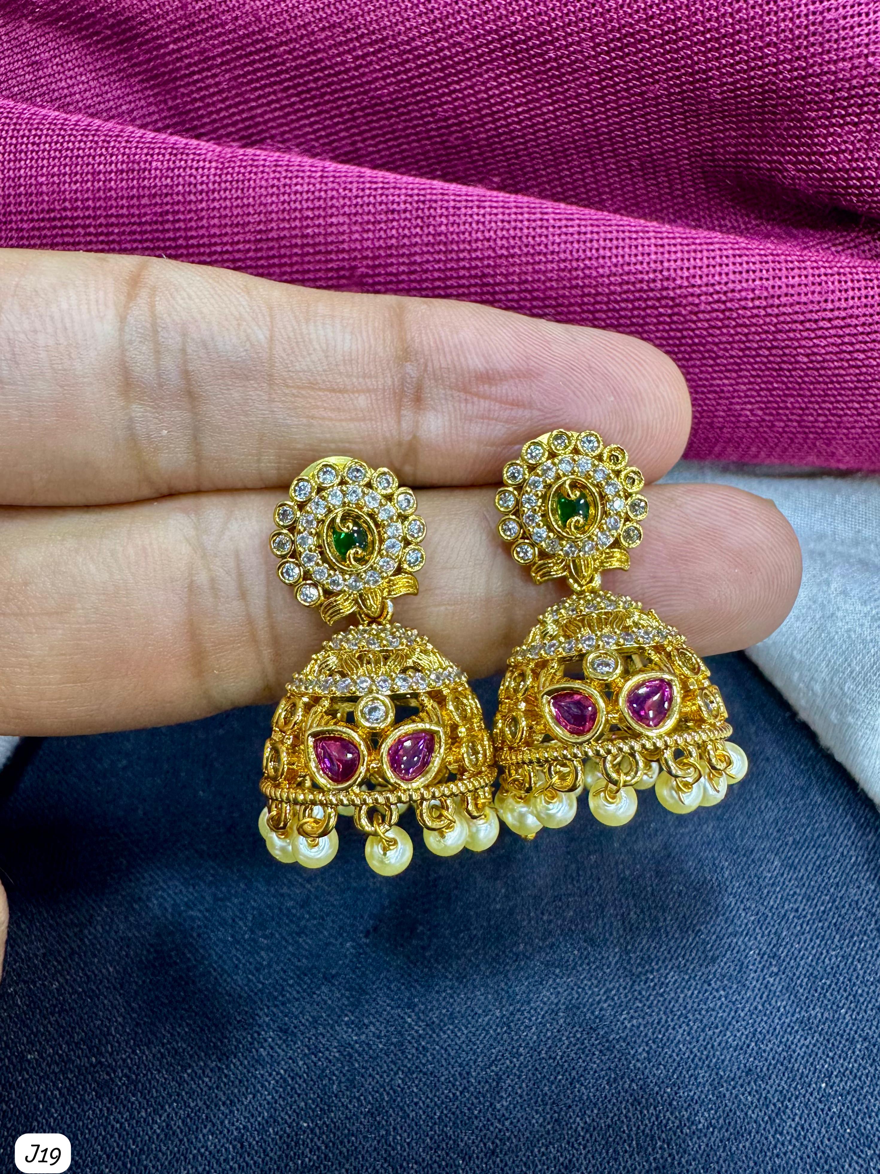Gold-Plated Jhumka Earrings with Pink Stones & Pearl Drops