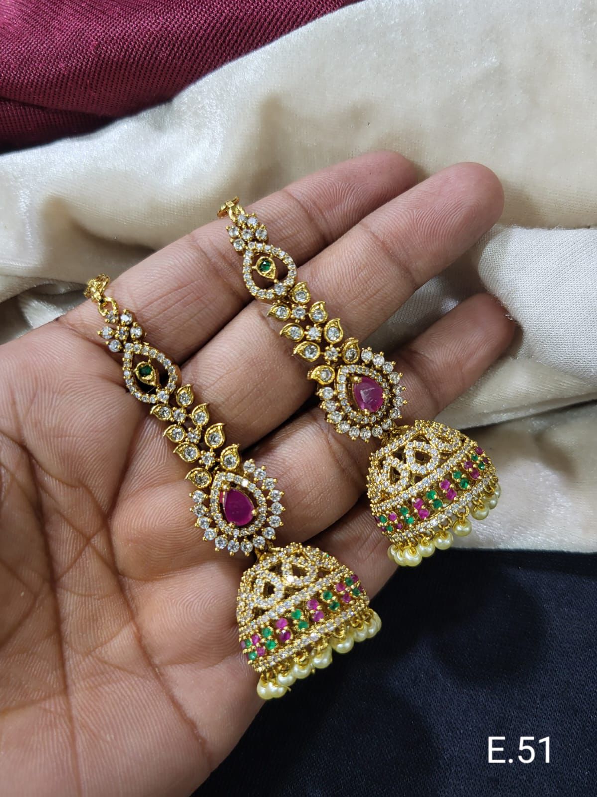 Antique Finish AD Jhumka Earrings with Pearl Drops and Stone Detailing