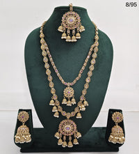 Traditional Kundan Long Necklace Set with Jhumka Earrings and Maang Tikka