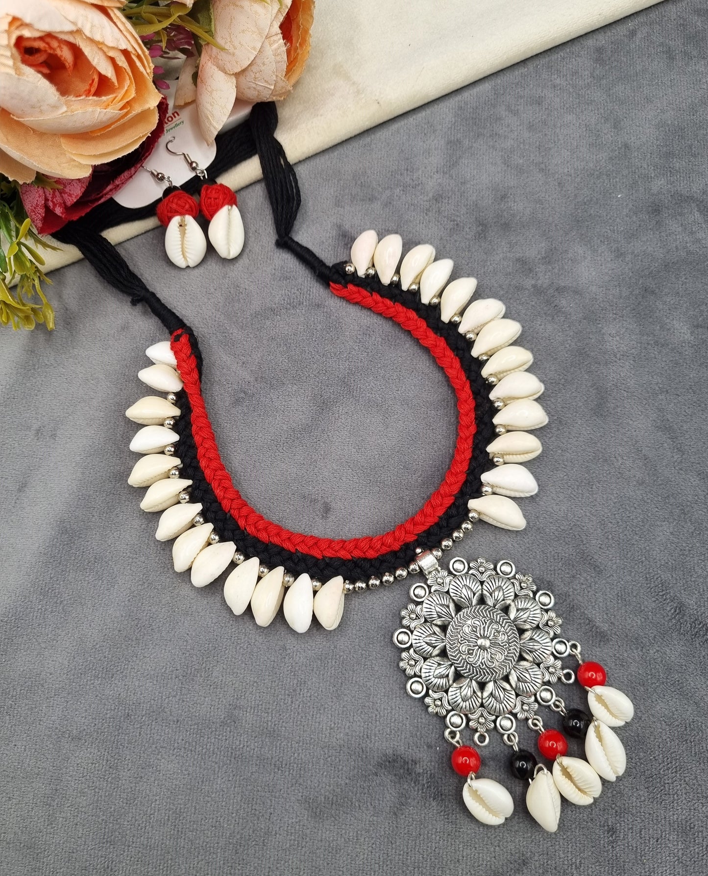 Handcrafted Oxidized Flower Medallion & Cowrie Shell Set