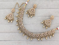 Antique Gold-Tone Stone Studded Jewelry Set with Maangtikka