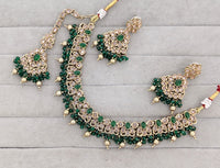 Antique Gold-Tone Stone Studded Jewelry Set with Maangtikka