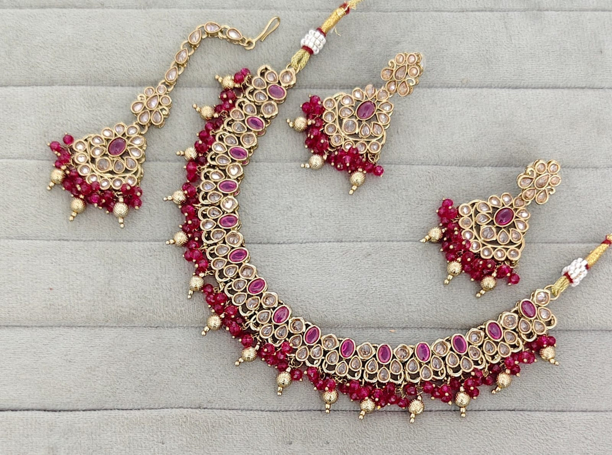 Antique Gold-Tone Stone Studded Jewelry Set with Maangtikka