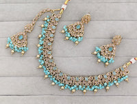 Antique Gold-Tone Stone Studded Jewelry Set with Maangtikka