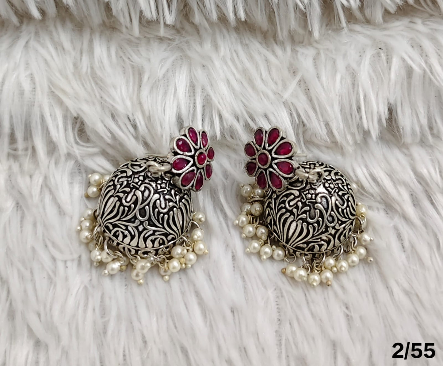 Floral Stud Oxidized Jhumka Earrings with Pearl Detailing