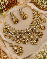 Antique Gold Floral Necklace Set with Jhumka Earrings & Maangtikka