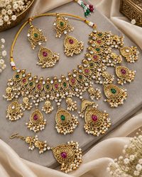 Antique Gold Floral Necklace Set with Earrings & Maangtikka