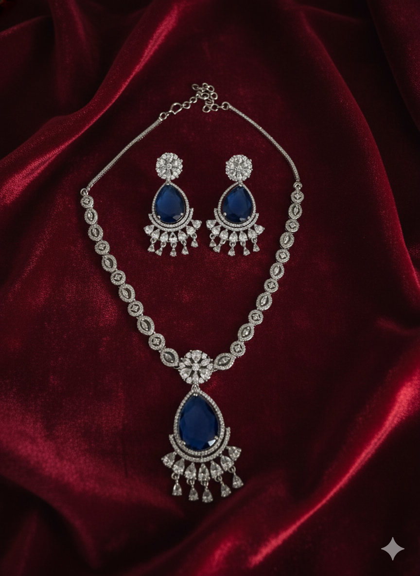 Designer Cluster AD Necklace with Blue Solitaire