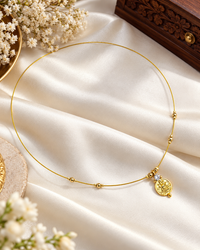 Invisible Wire Lakshmi Coin Pendant Necklace with Gold Bead Accents