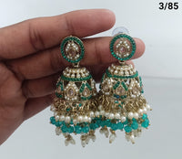 Royal Dome Jhumka Earrings with Kundan and Pearl Finish
